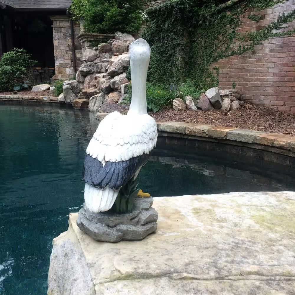 20 In. Pelican Bronze Collectible Beach Statue on Coastal Rock
